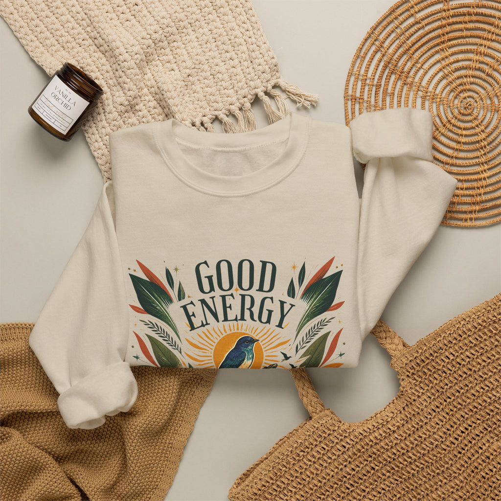 White unisex sweatshirt with botanical “Good Energy” logo graphic on chest