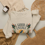 White unisex sweatshirt with botanical “Good Energy” logo graphic on chest