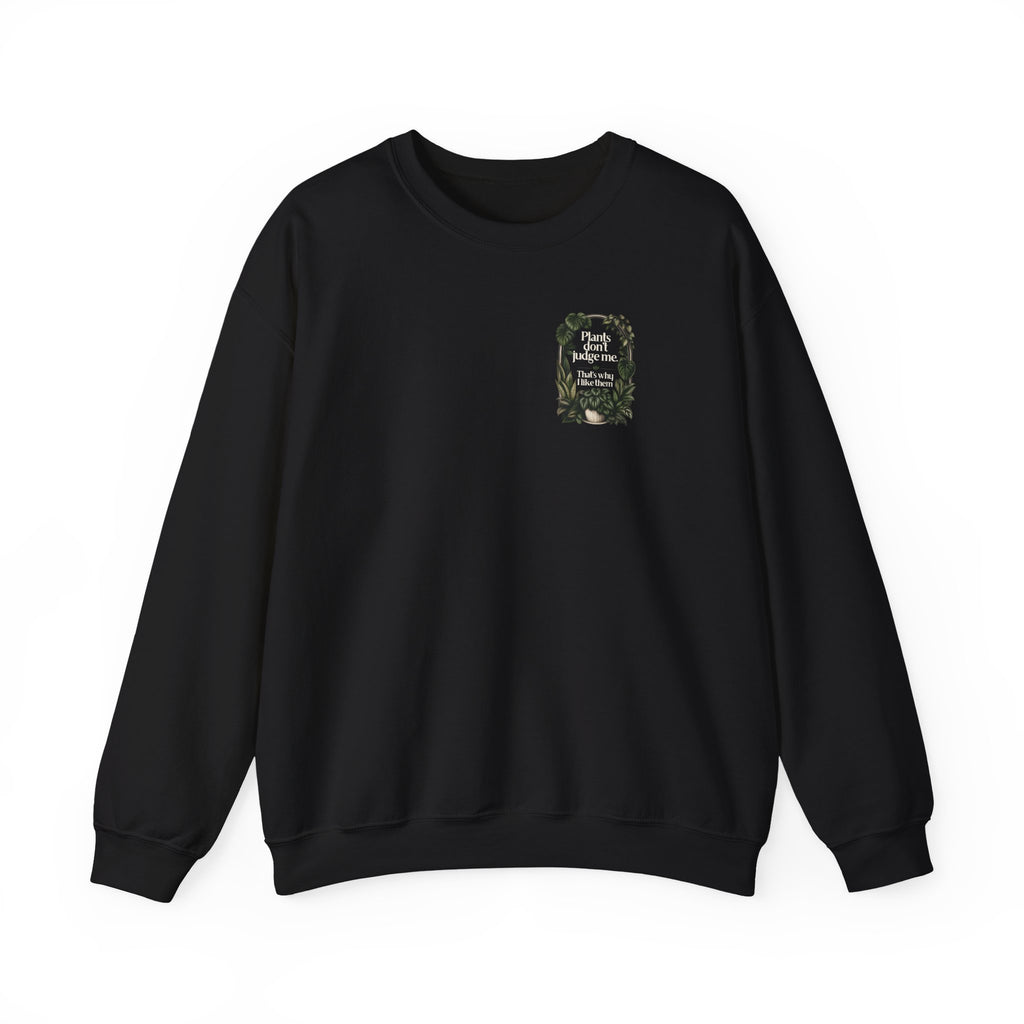 Black crewneck sweatshirt with small front plant graphic and slogan
