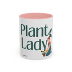 White coffee mug with pink interior, large green “Plant Lady” text and plants