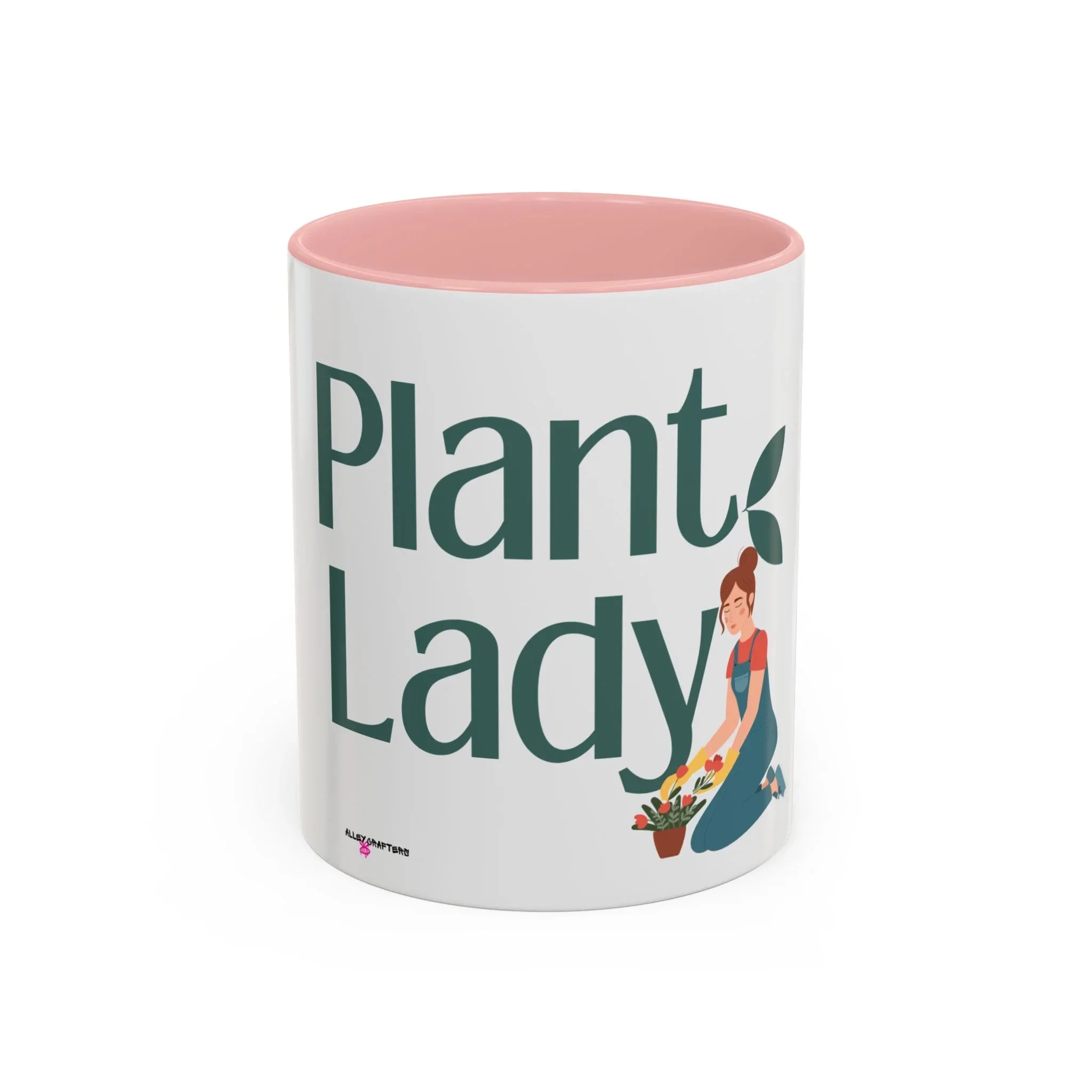 White coffee mug with pink interior, large green “Plant Lady” text and plants