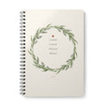A5 spiral notebook, floral wreath cover with “Grateful Focused Motivated Blessed”