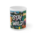 White ceramic mug with 'STAY WILD!' colorful collage print, front view