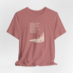 Rose pink hiking T-shirt with woods scene graphic and quote text on front