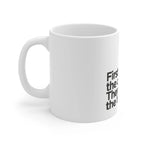 White ceramic coffee mug side view with partial black quote text.