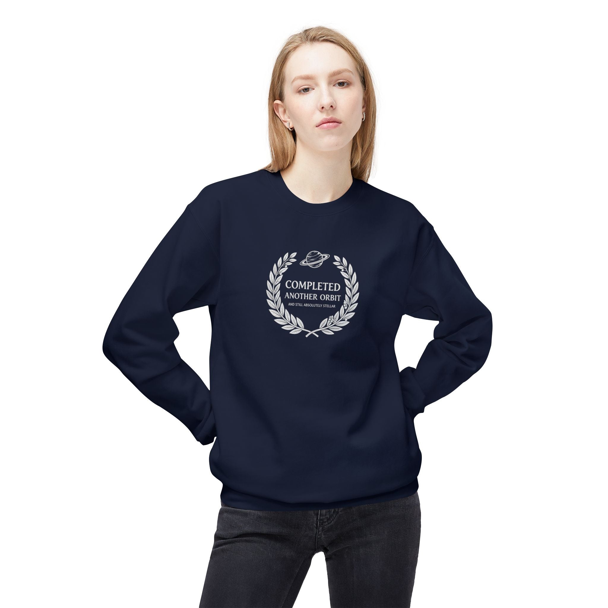 Navy crewneck sweatshirt with “Completed Another Orbit” circular logo, front view