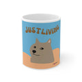 Dog portrait ceramic mug with blue “JUST LIVING” text on front