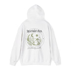 White pullover hoodie on model, hood up, back moon and “Trust God’s Plan” graphic