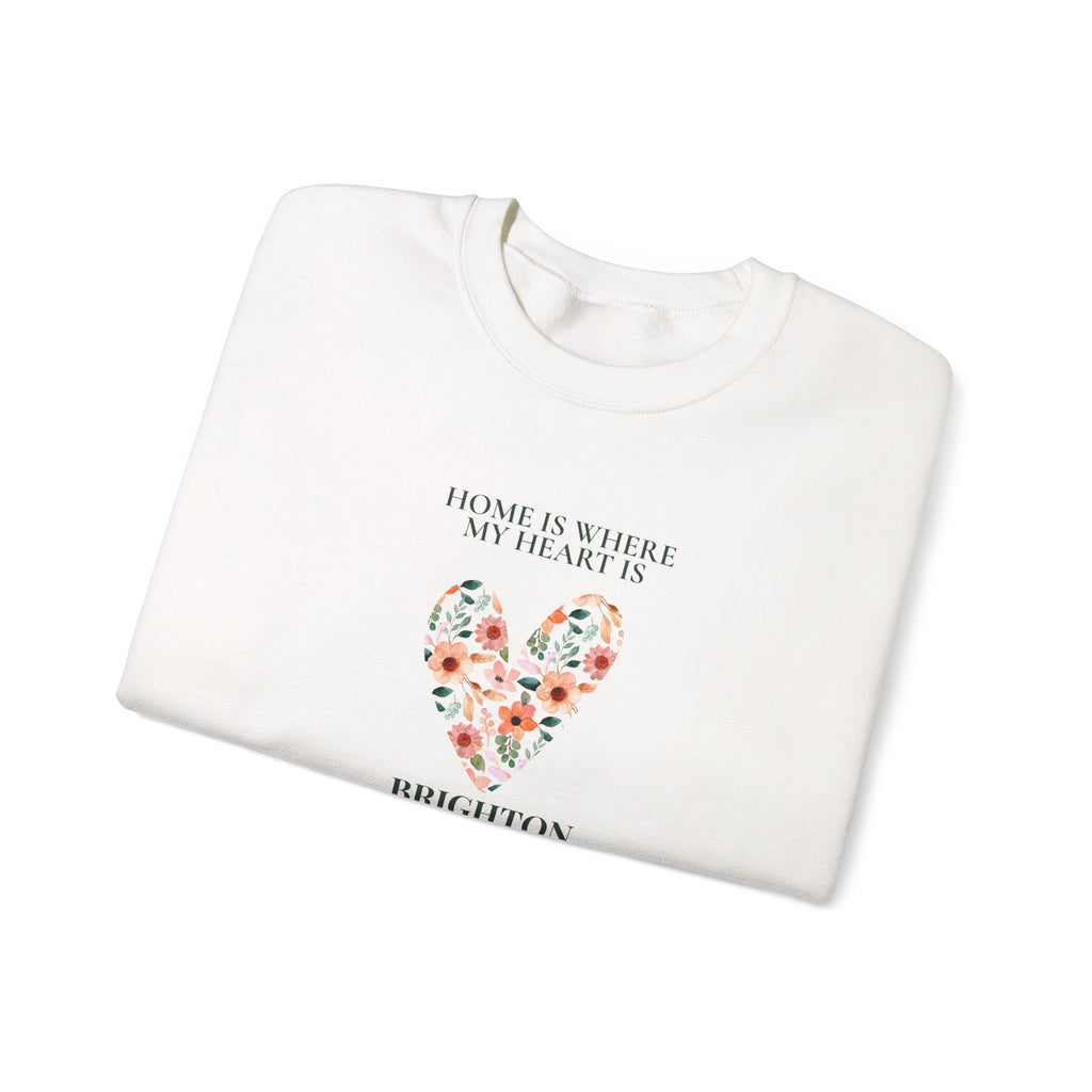 White personalised sweatshirt folded with floral heart graphic and location text on chest