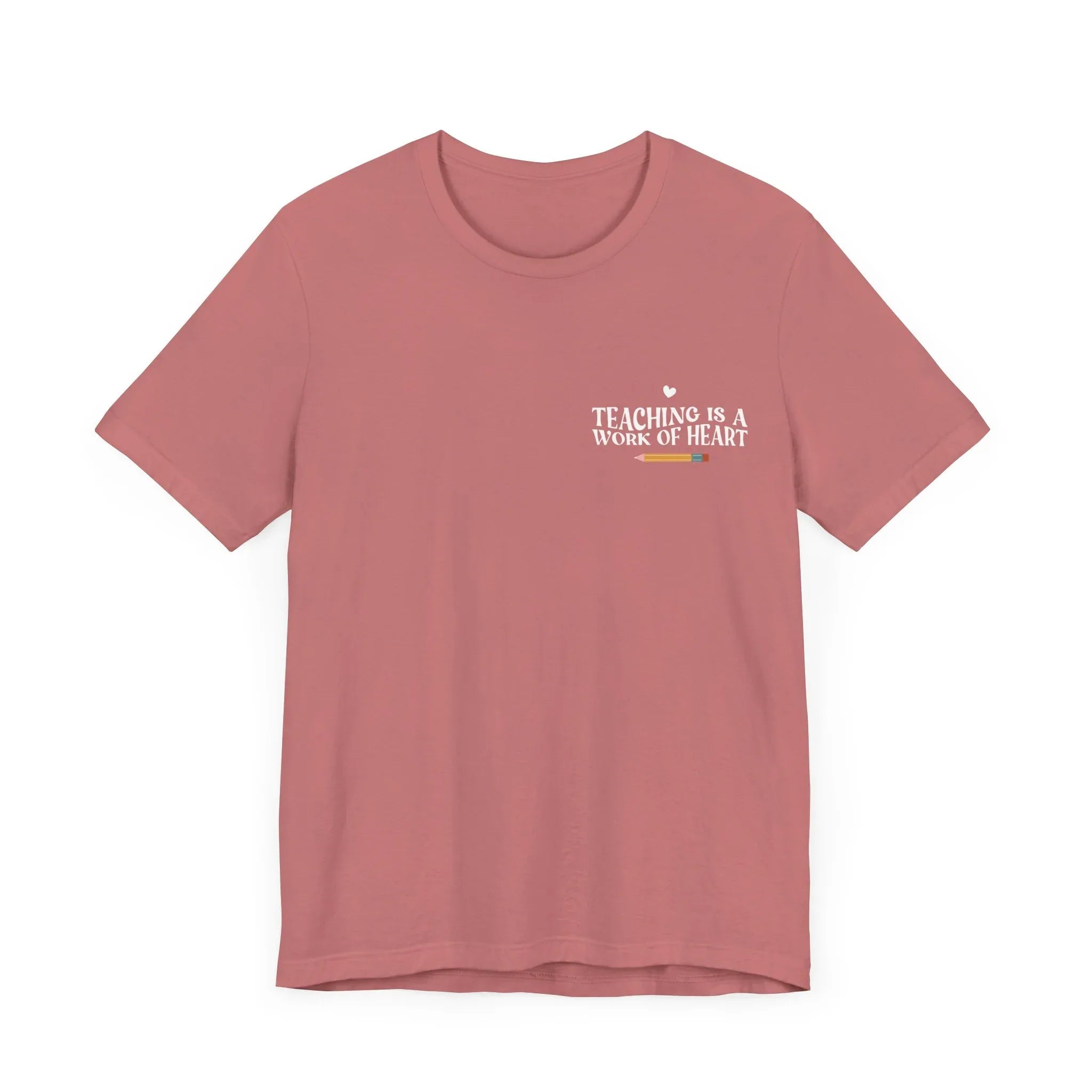 Mauve unisex t-shirt with “Teaching is a work of heart” heart-and-text graphic