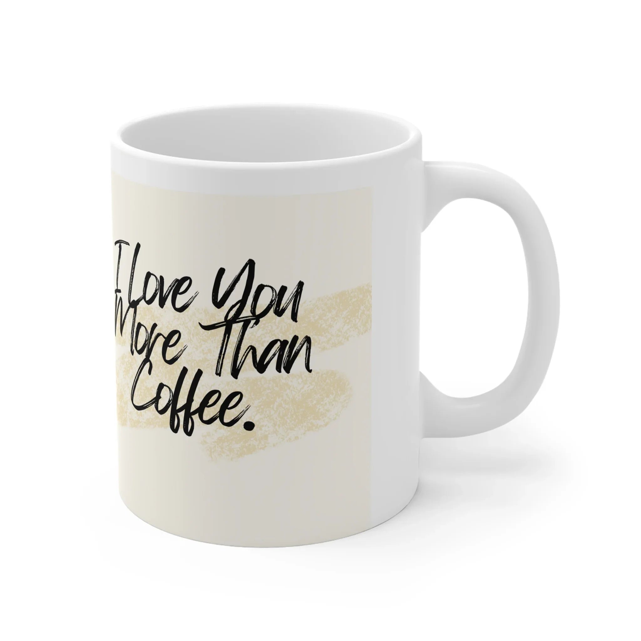 White coffee mug with black script text: I love you more than coffee.