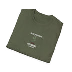 Olive green t-shirt folded flat with 'Slow Progress Is Still Progress' plant graphic