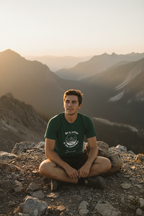 2. James on rocky summit — Forest green UGC
