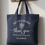 Navy tote bag with 'There's No Better Friend' lavender bouquet and thank you text, handles
