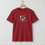 Burgundy botanical t-shirt with green plant graphic and white slogan text