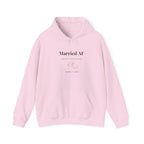 Light pink couples hoodie with drawstring hood, kangaroo pocket, "Married AF" and ring graphic