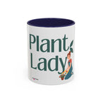 White coffee mug with navy interior, large green “Plant Lady” text and plants