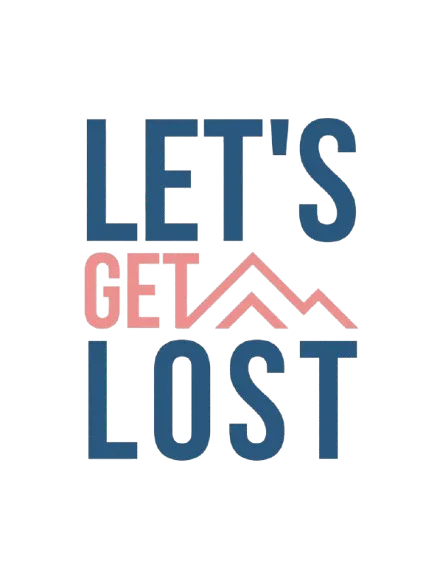 Close-up of “LET'S GET LOST” text graphic in blue, red, and white