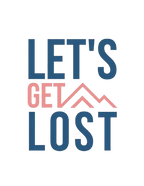 Close-up of “LET'S GET LOST” text graphic in blue, red, and white