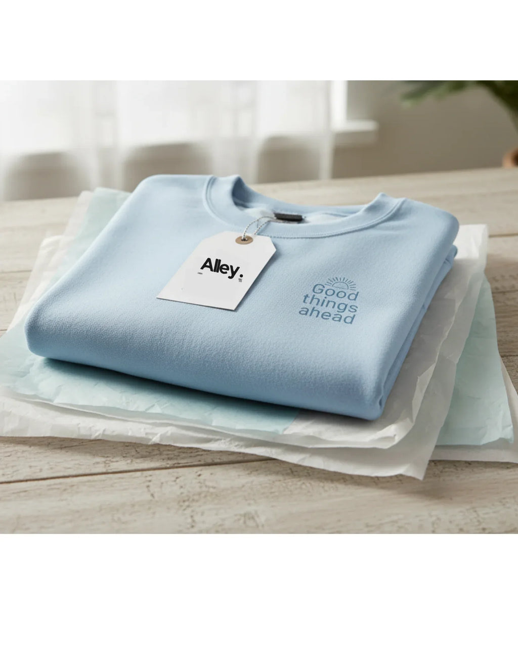 Light blue crewneck sweatshirt with "Good things ahead" chest graphic