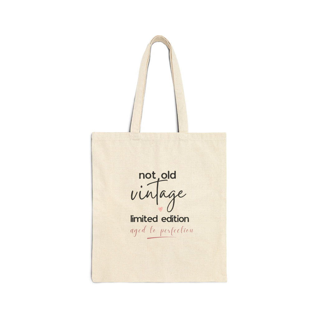 Natural canvas tote bag with 'not old vintage' and 'limited edition' front text