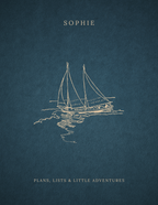 Close-up dark teal notebook cover with sailboat line art and title text
