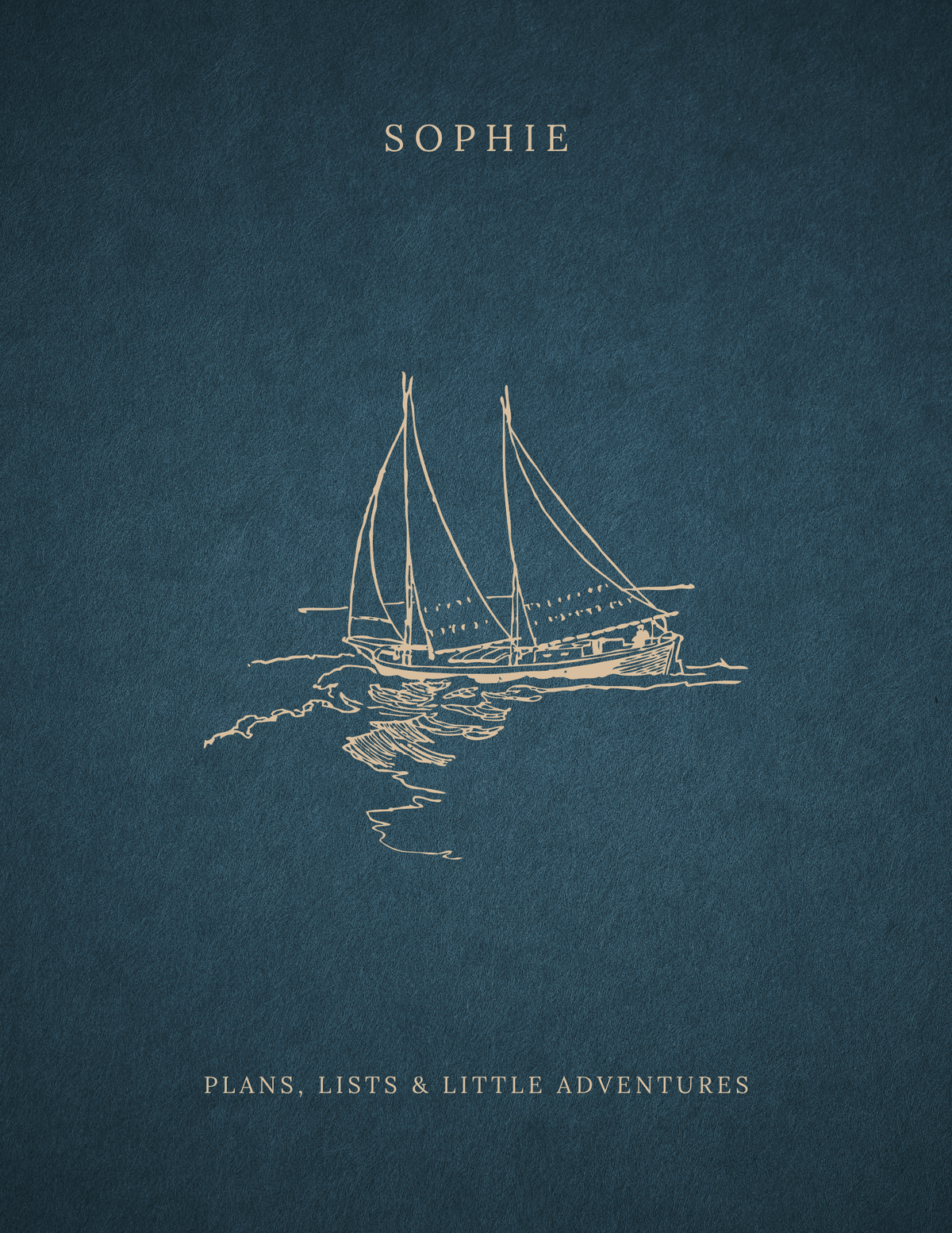 Close-up dark teal notebook cover with sailboat line art and title text