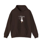 Dark chocolate duck pose hoodie with hood, drawstrings, and center duck graphic