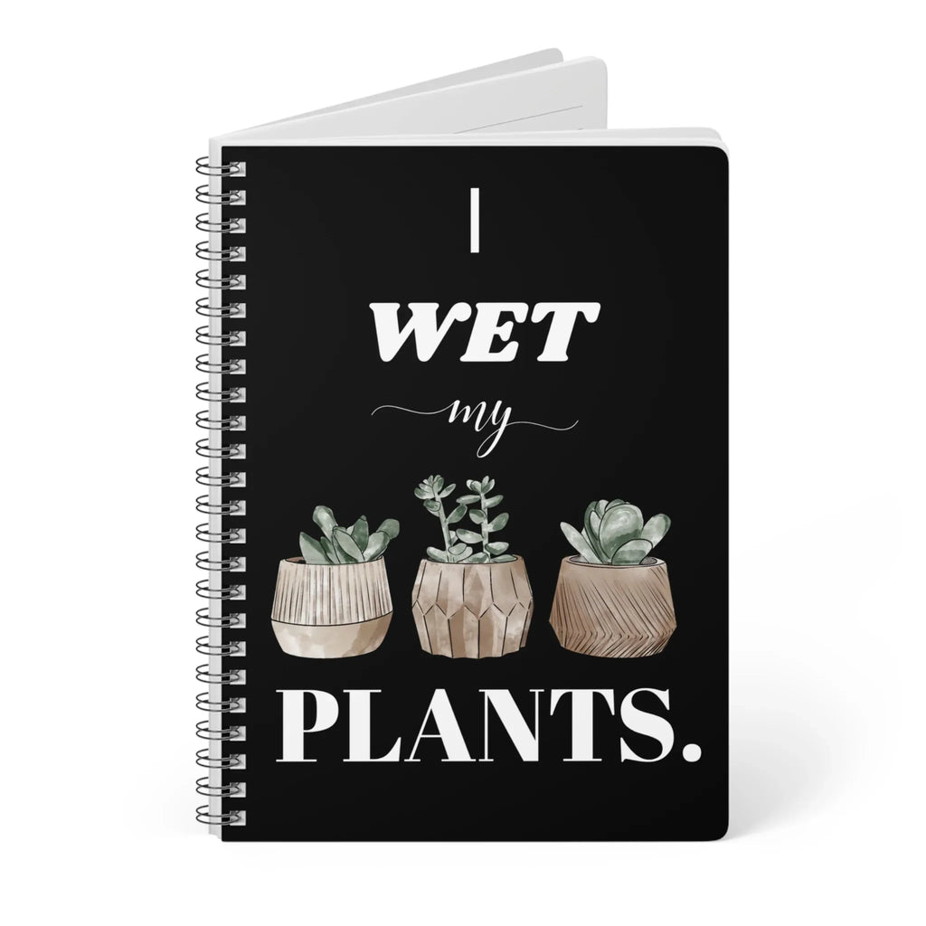 A5 spiral notebook with black cover, “I wet my plants” text and succulent pot artwork.