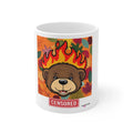 White ceramic bear mug with fiery flames artwork and red “CENSORED” label, front view.