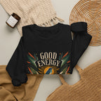 Black unisex sweatshirt with “GOOD ENERGY” botanical bird graphic on front