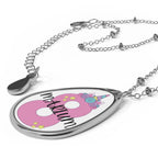 Silver necklace with unicorn-themed pink oval pendant and "MARIUM"