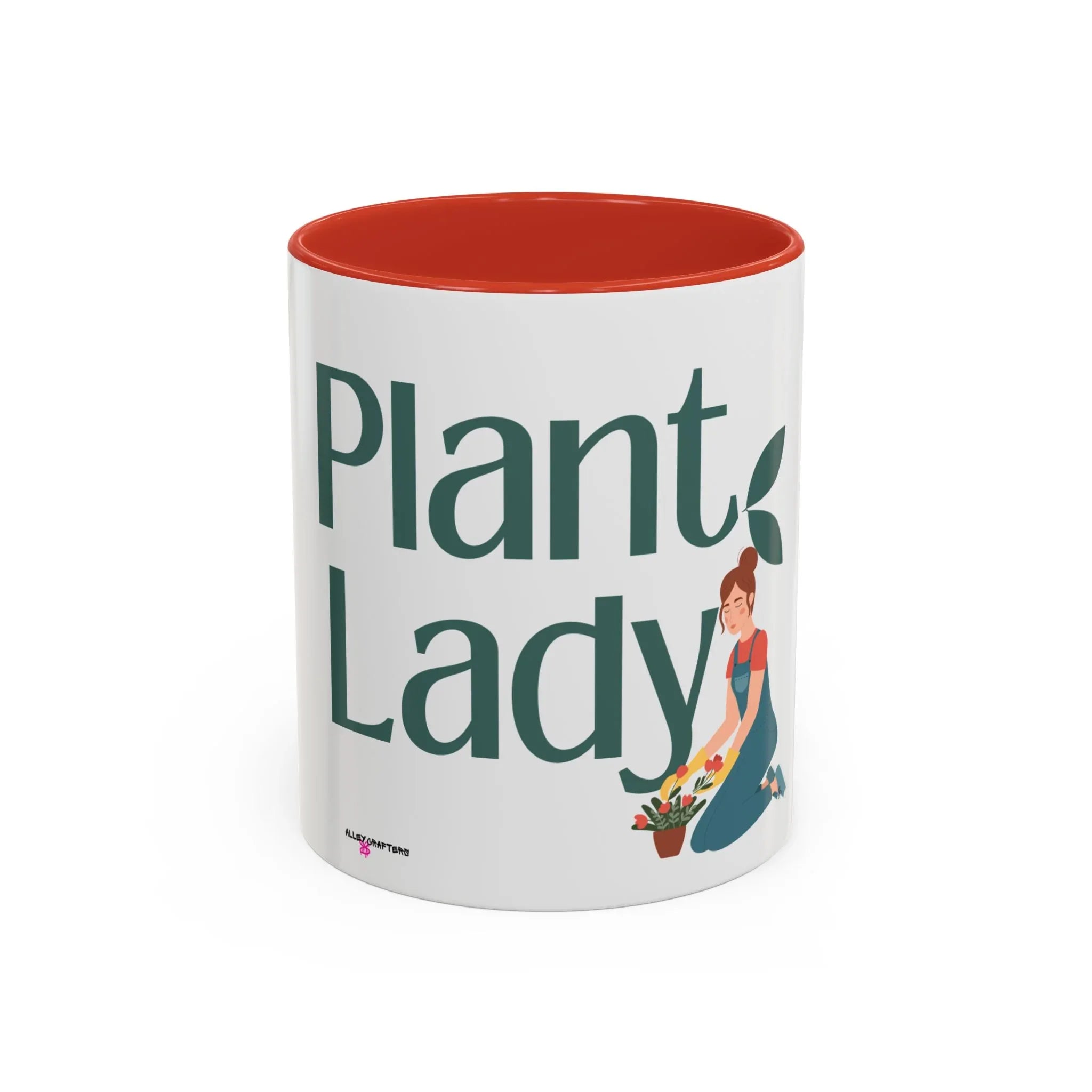 White coffee mug with orange interior, large green “Plant Lady” text and plants
