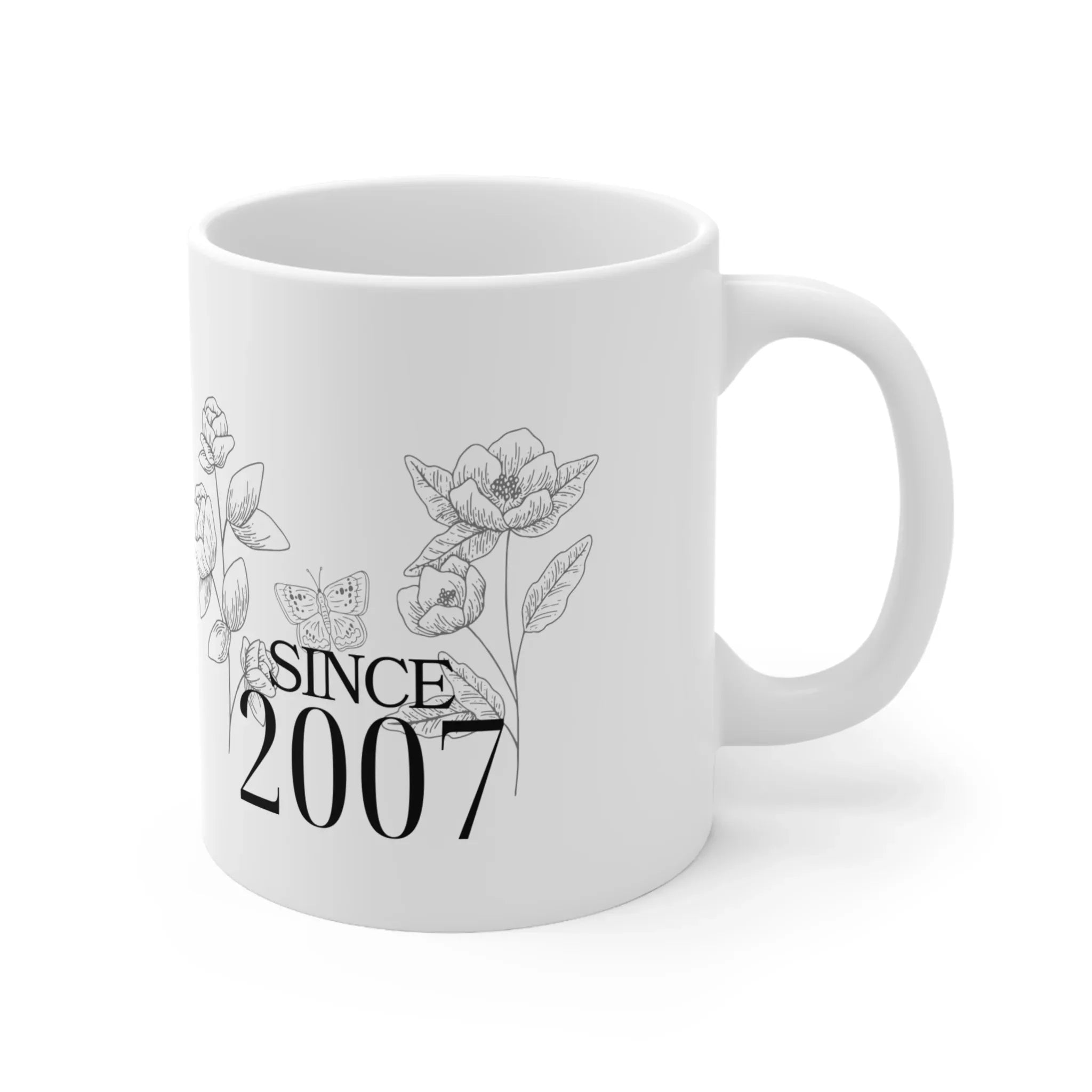 White ceramic mug with floral line art and text SINCE 2007 on front