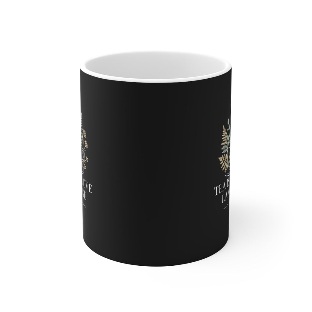 Black personalized tea mug with partial floral design on side and white interior