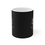 Black personalized tea mug with partial floral design on side and white interior