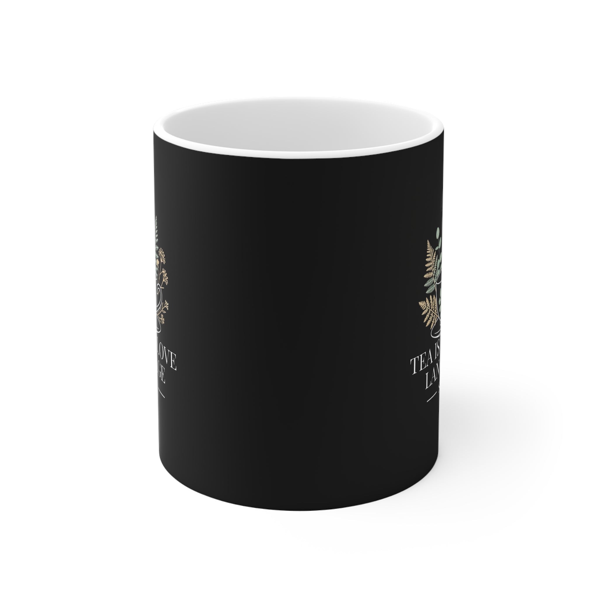 Black personalized tea mug with partial floral design on side and white interior