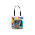 White tote bag with nature-themed headphones graphic and black handles