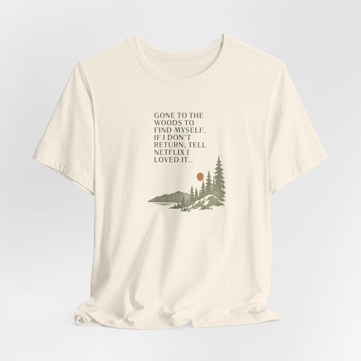 Natural off-white hiking T-shirt with woods scene graphic and quote text on front