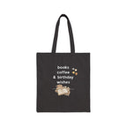 Black tote bag with 'books coffee & birthday wishes' and open-book graphic