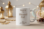 White ceramic mug with gold “Have a Blessed Eid” and crescent moon on front