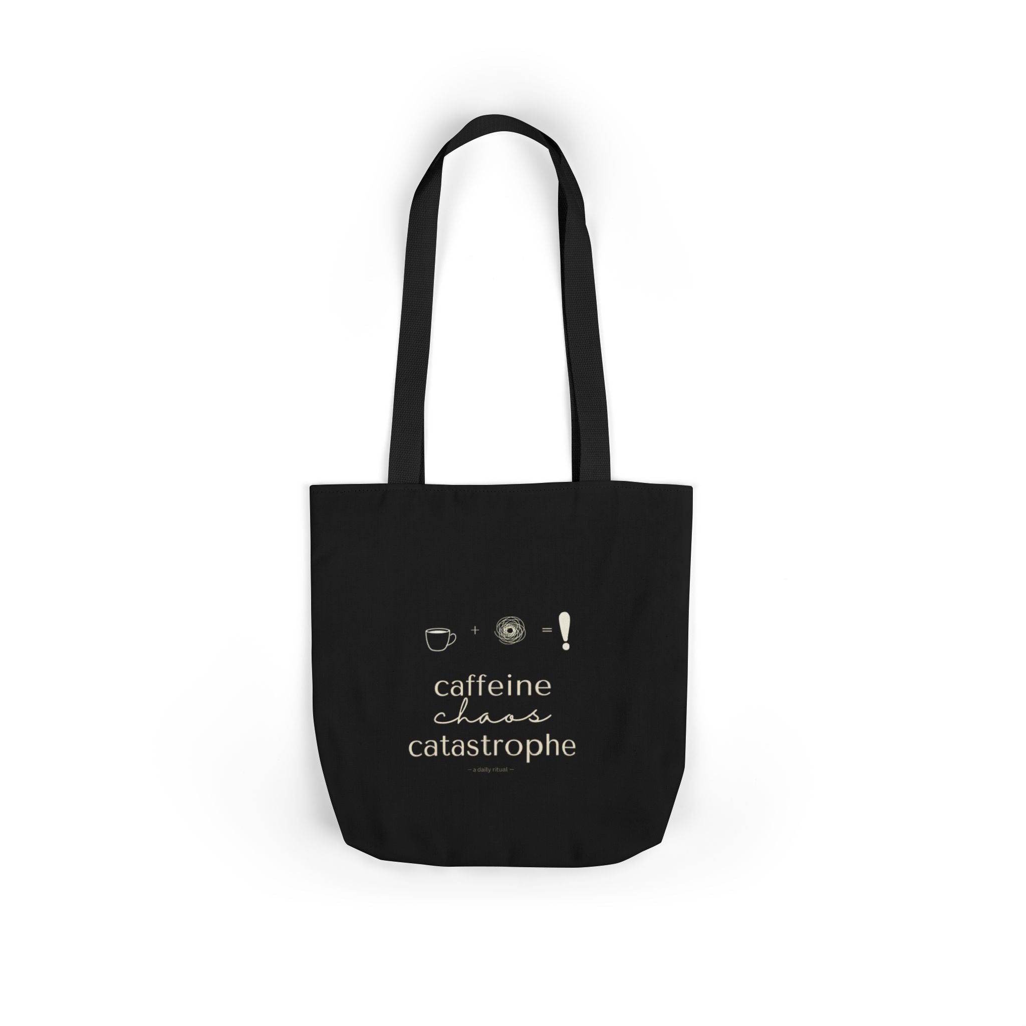 Black tote bag with “caffeine chaos catastrophe” text and small icon graphics.
