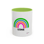 Personalised rainbow mug with LEONIE name, white body with light green rim and rainbow graphic