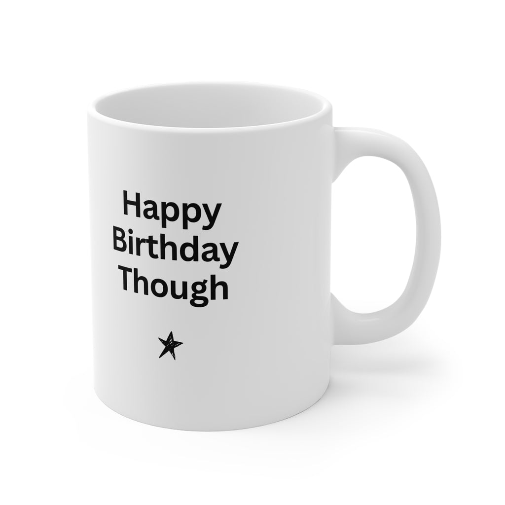 White coffee mug with black text: Happy Birthday Though and a small star below