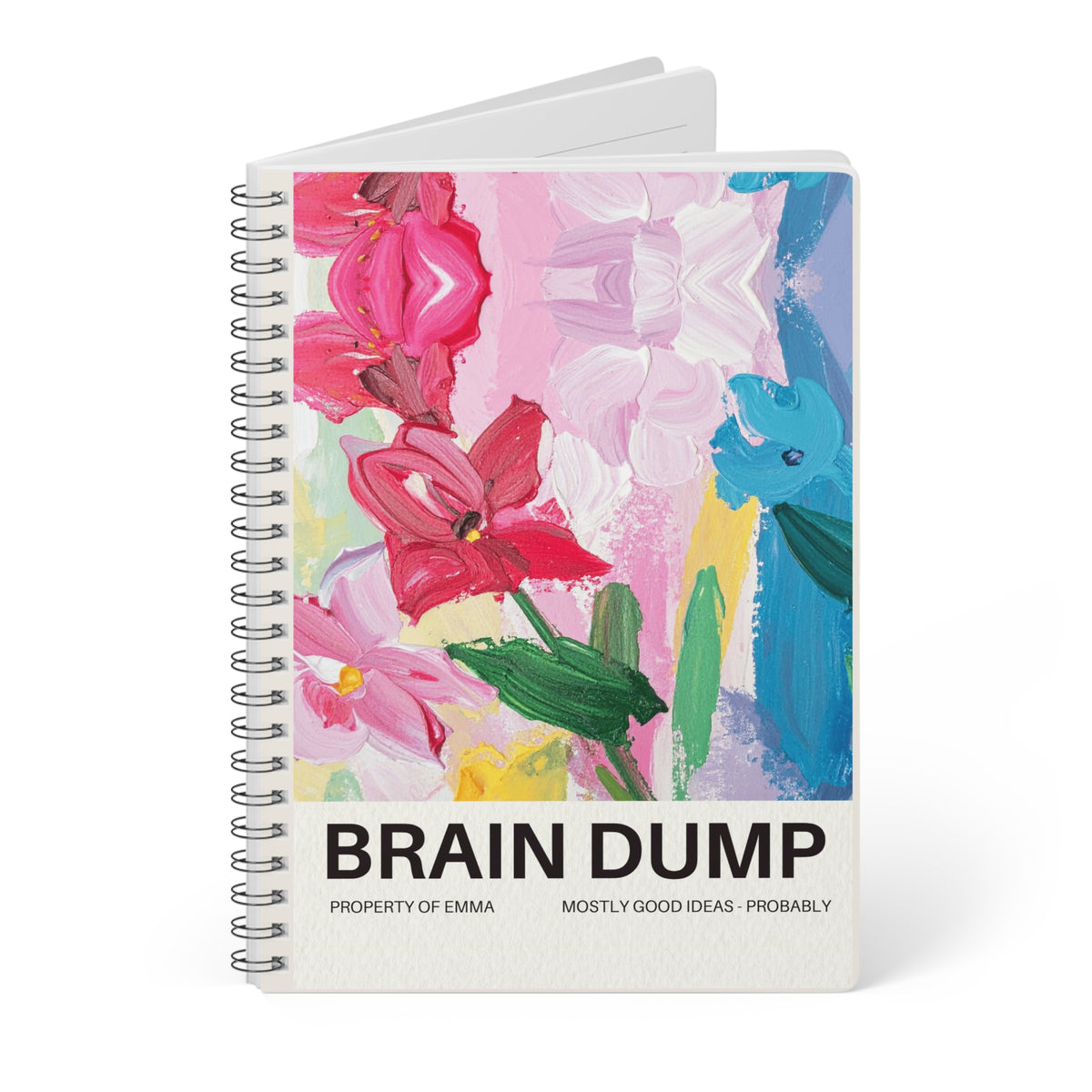 A5 spiral notebook with colorful floral cover and bold title text on the front