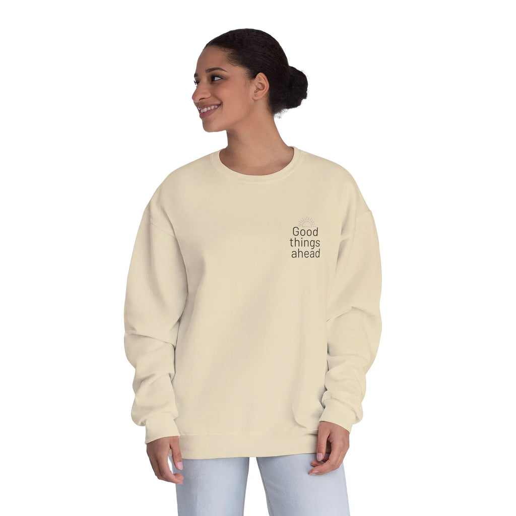 Cream crewneck sweatshirt with chest logo, worn