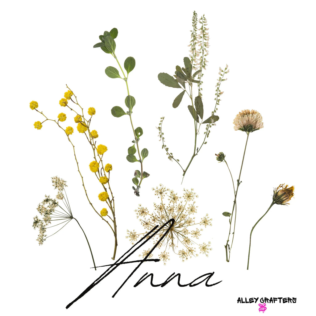 White tote bag with botanical stems and flowers graphic, cursive word at bottom