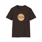 Dark chocolate crew-neck T-shirt with circular tree-ring badge graphic reading 'Seasoned'