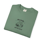 Green T-shirt with black “Mentally” mountain graphic and “Off the Grid” text