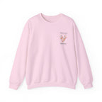 Light pink personalised sweatshirt with floral heart graphic and location text on chest
